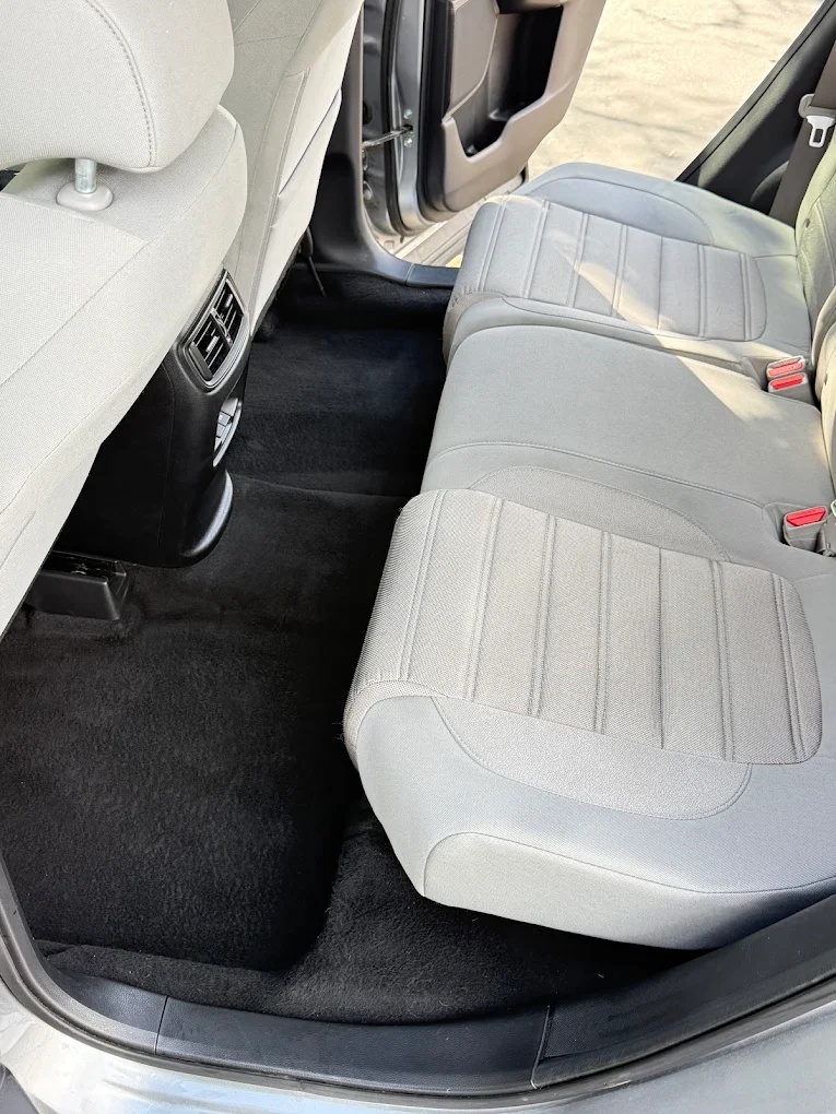 Freshly shampooed rear seats and carpet after a full interior detail